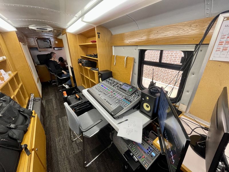 Audio console and monitors inside a mobile production vehicle