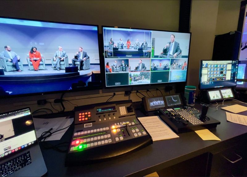 Control position with multiview monitors and a video switcher for four robotic cameras